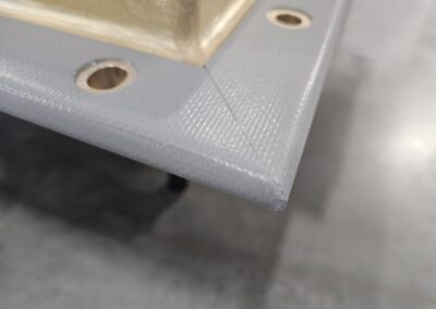 Photo of an electromagnetic window radome bolting flange.